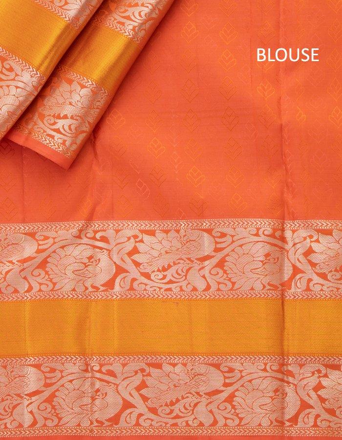 Light Green Self Designed Silk Saree With Orange Border And Gold And Silver Zari Work - Kumaran Silks