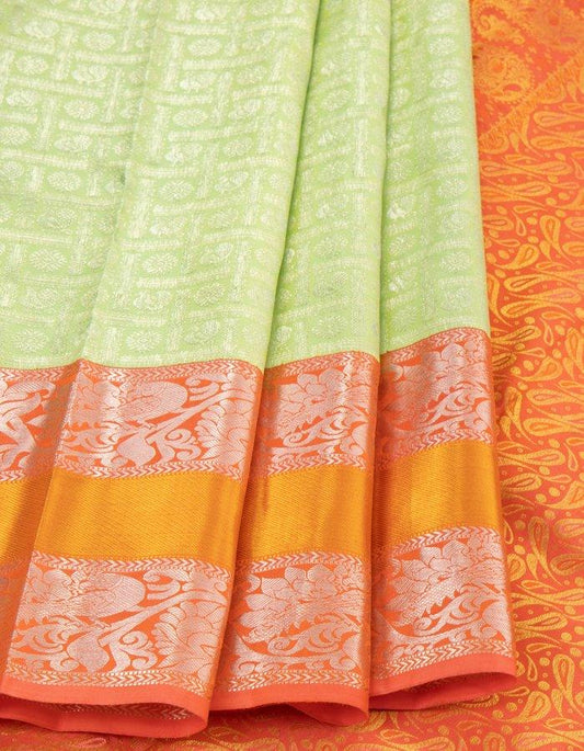 Light Green Self Designed Silk Saree With Orange Border And Gold And Silver Zari Work - Kumaran Silks