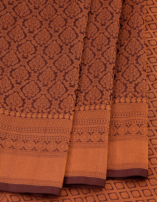 Traditional Brown Brocade Silk Saree With Printed Motifs Over The Body Kumaran Silks